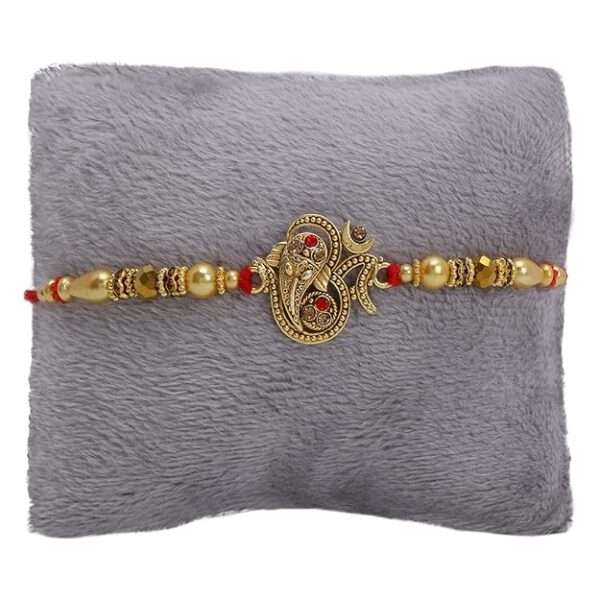 Riddhika Ventures Glorious Gold Plated Auspicious and Diamond Ring Rakhi with Roli Chawal and Greeting Card (K15)